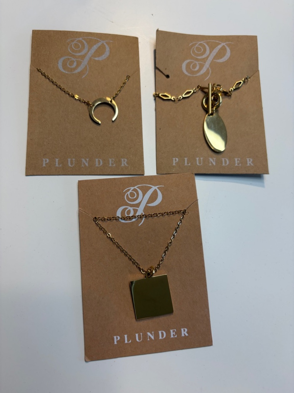 Plunder Gold-Tone Layered Pendant Necklace Set - Crescent, Oval & Square